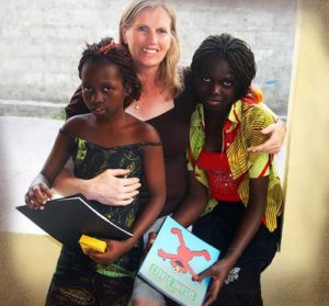 Angé Workman in 2010 with two girls from the DRC Tifie Youth Center