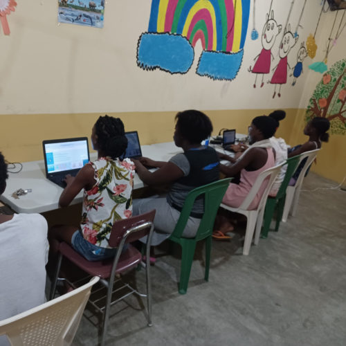 youth using donated laptops